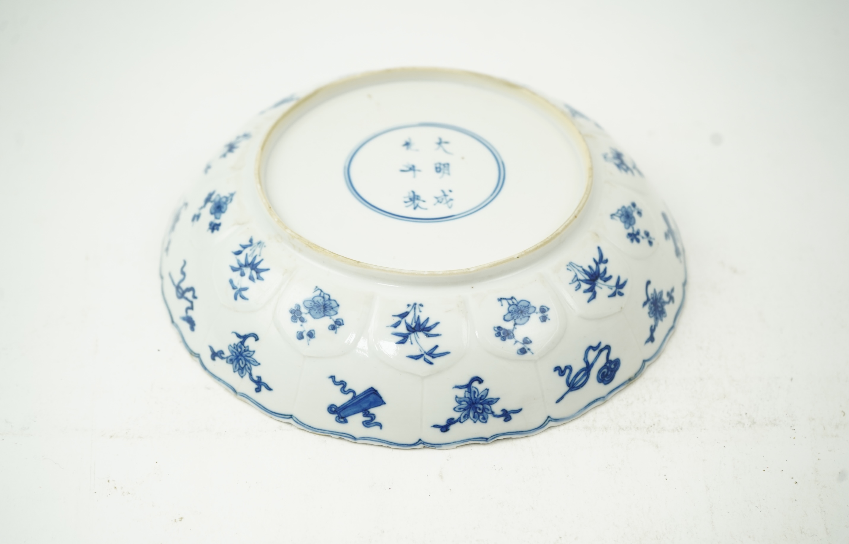 A Chinese blue and white ‘ladies and phoenix’ dish, Kangxi period